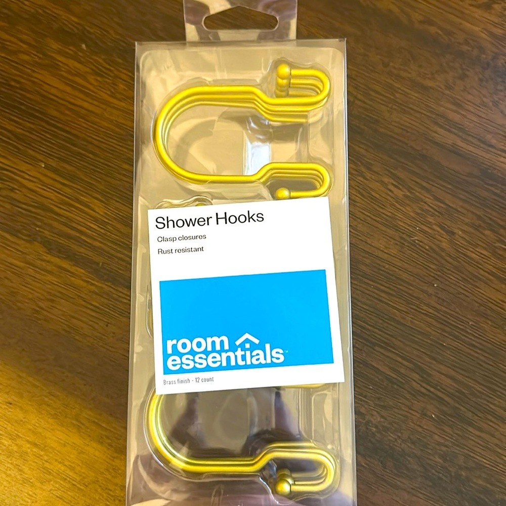 Shower curtain hooks in brass finish. New